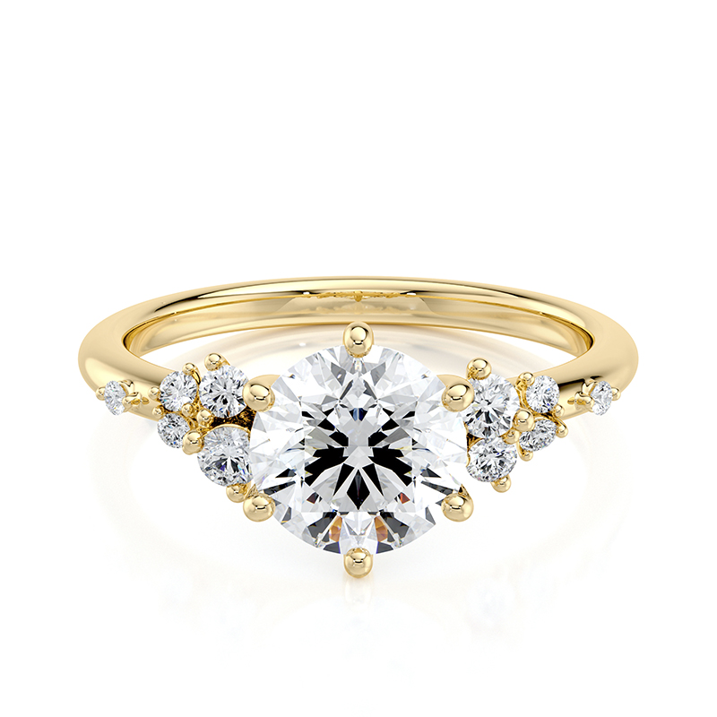 Stargaze ring — front view of round brilliant centre with scattered side diamonds